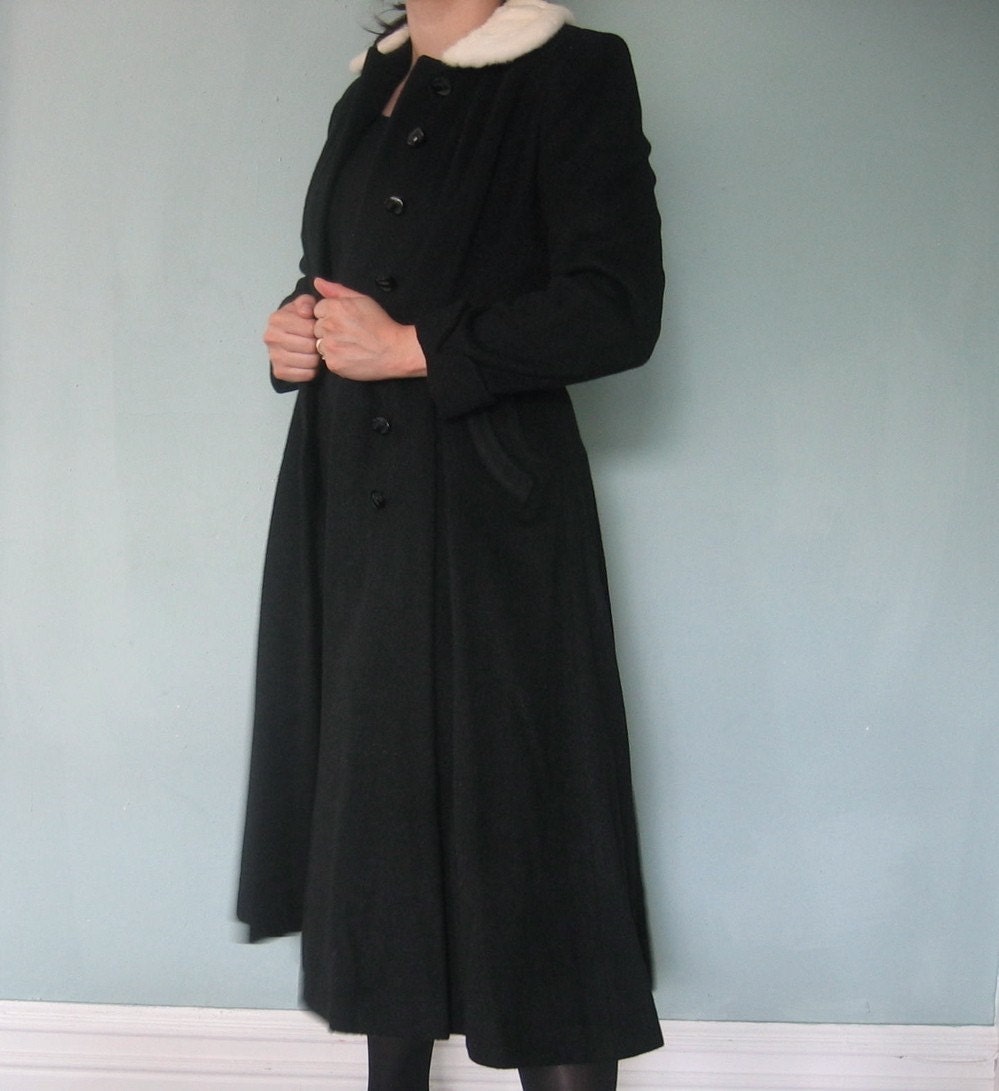 black dress with fur coat