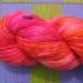 Hand dyed one of a kind sock yarn superwash wool nylon blend Shocking pink orange black