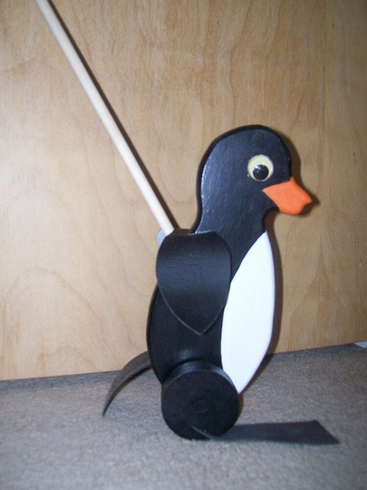 melissa and doug penguin push toy