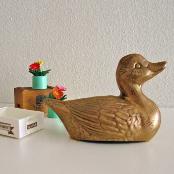 solid brass duck figurines