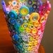 Upcycled Rainbow Vase Sculpture made from Magazines, Candy Wrappers, Catalogs & Coupon Circulars