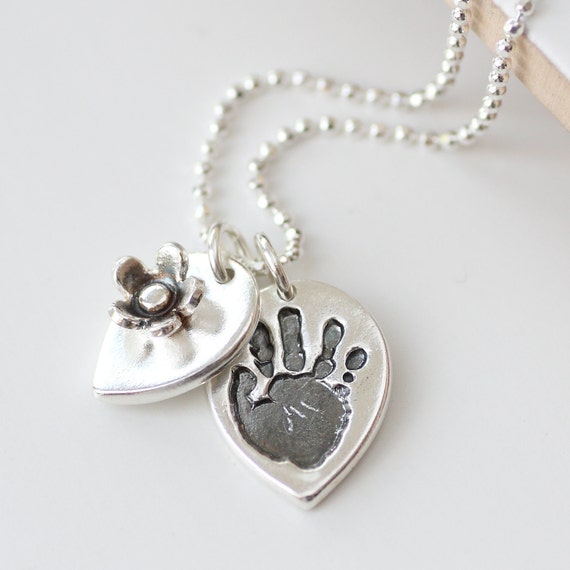 Items similar to Handprint Footprint Personalised Silver Petal Necklace