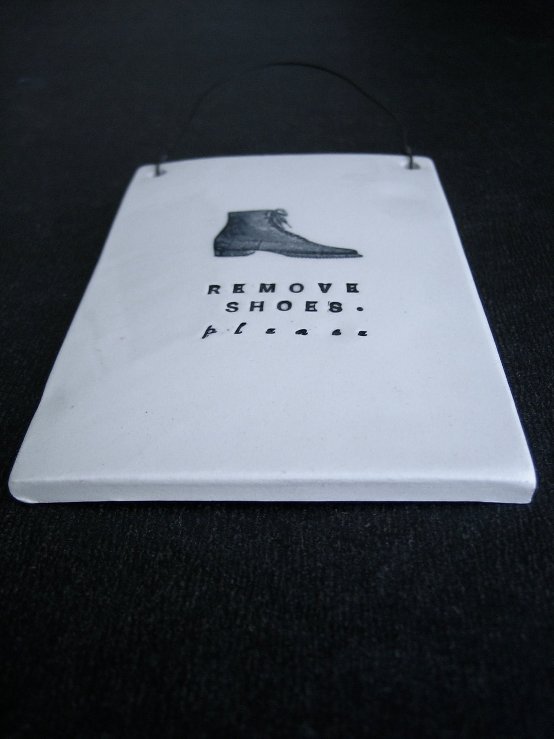 REMOVE SHOES plaque boot