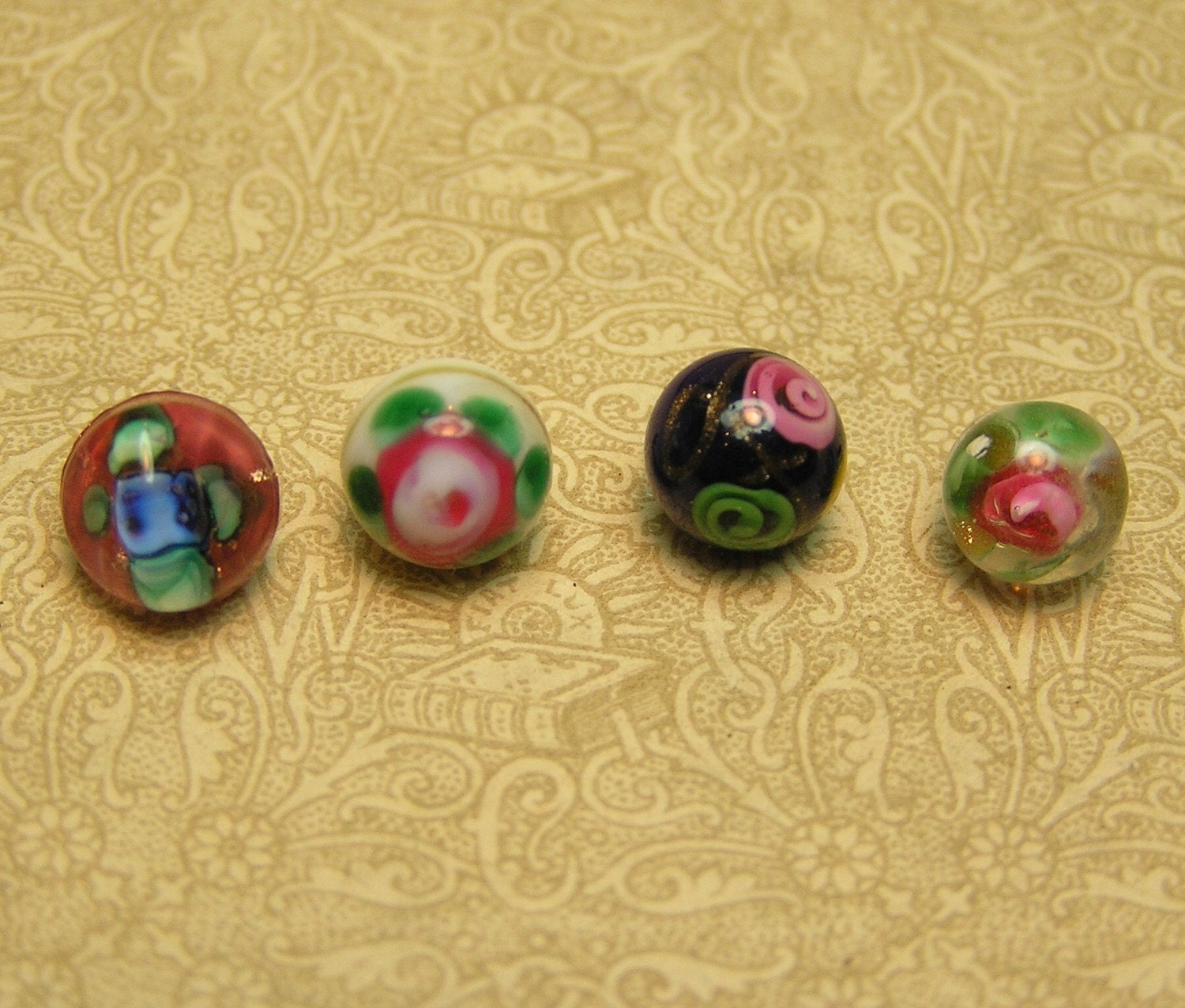 Four Vintage Paperweight Buttons