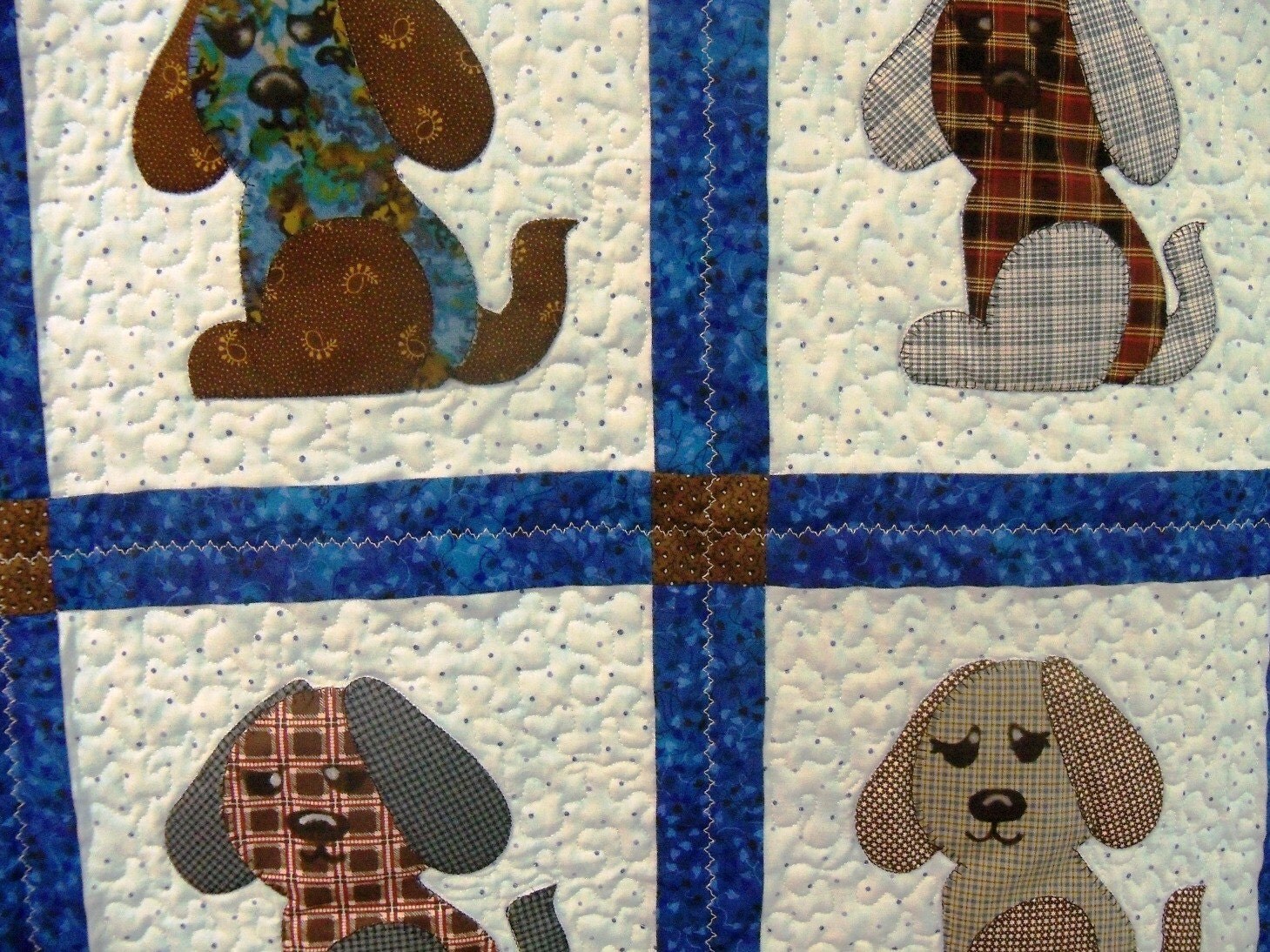 Appliqued puppy quilt