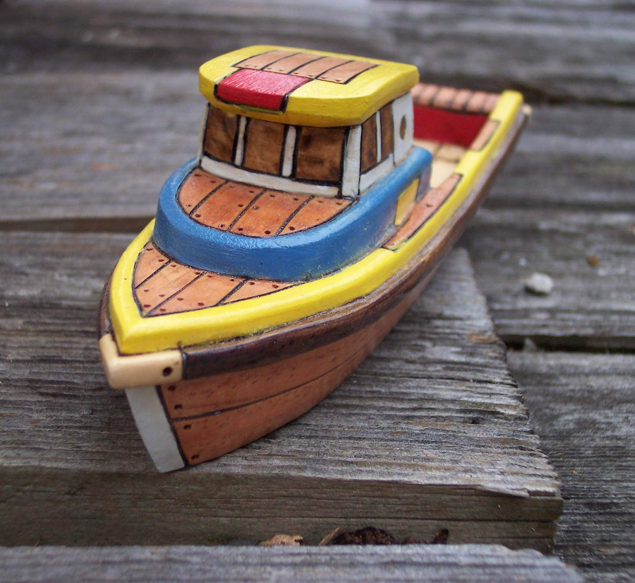 Yellow and Blue Toy Wooden Boat