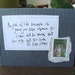 Be glad of life Card with written quote and postal stamp Dark grey