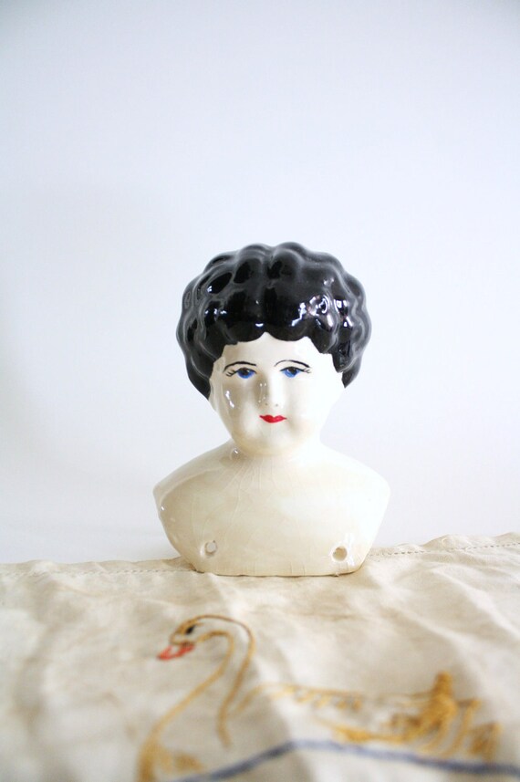 antique porcelain dolls with black hair