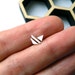 All Things Considered - asymmetrical trio of mini silver earrings - No.99