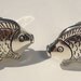 Large detailed silver tone fish clip on earrings