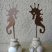 Seahorse Metal Sculpture on Pedestal with seashells