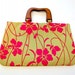 Wooden handle purse in pink and green