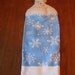 Blue And White Snowflake Hand Towel With White Crocheted Top
