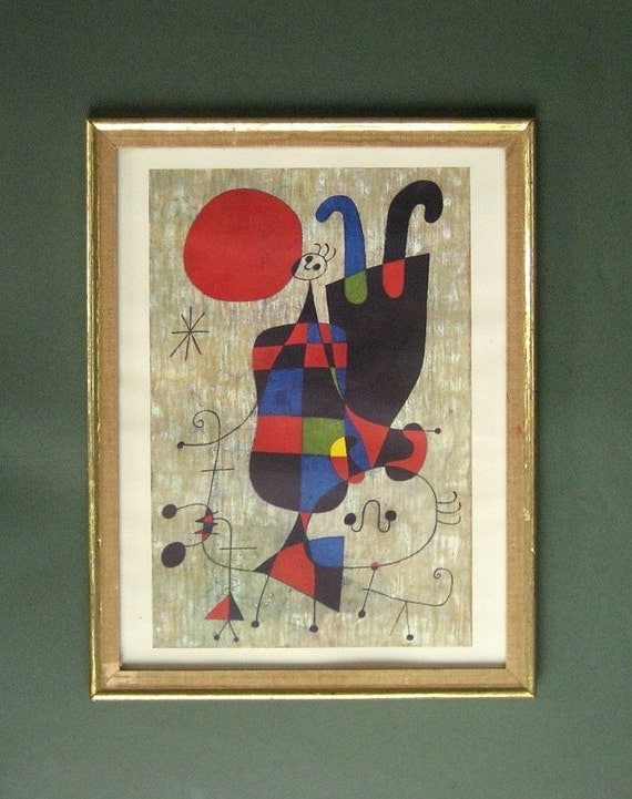 joan miro figures and dog in front of the sun