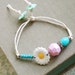 Sweet daisy.vintage beaded bohemian string bracelet. Tiedupmemories
