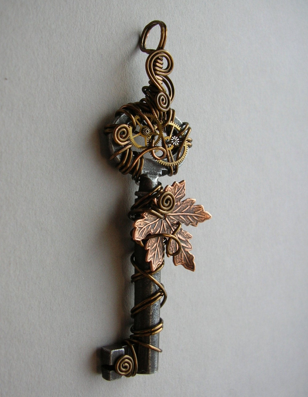 Falling Maple Leaf Clockwork Key Pendant A key to time