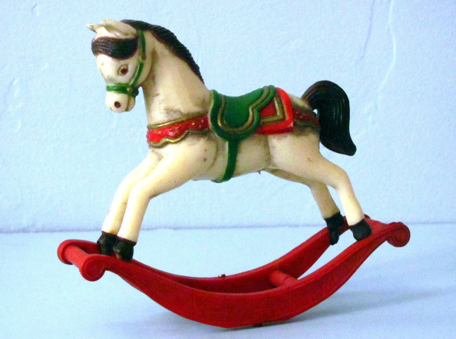 vintage plastic rocking horse