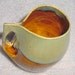Pottery Cup with Squashed Handle in Amber and Sage Green