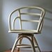 reserved.....vintage swivel white rattan arm chair / hollywood regency