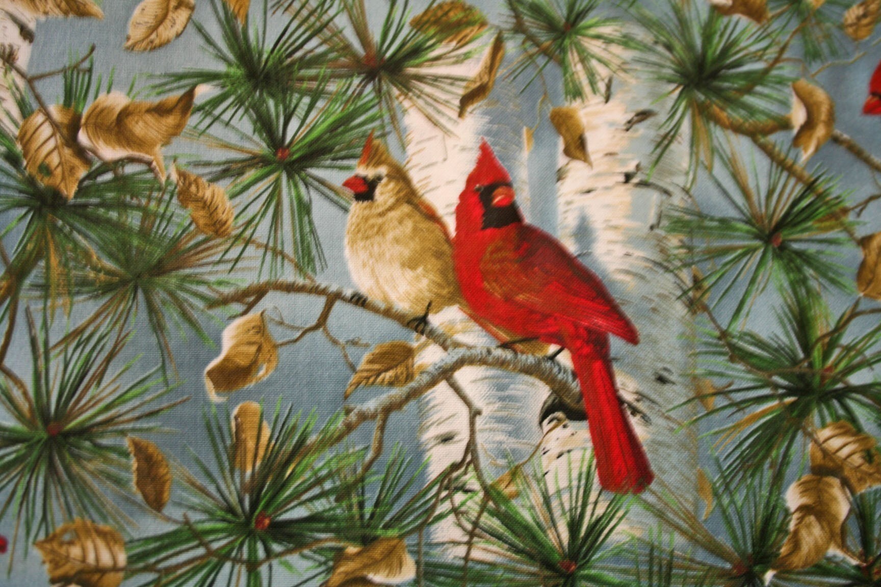 vintage cotton fabric cardinals on blue background