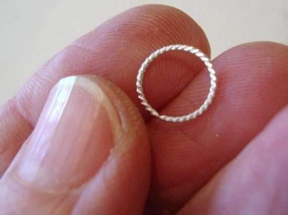 Items similar to nose ring ..sterling silver...TWISTED ENDLESS Nose