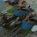 Feather Earrings, natural earthy colors with green and blue parrot feathers