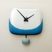Clock made from a recycled Apple ibook clamshell computer case