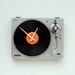 Clock made from a recycled Sanyo turntable