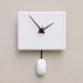 Clock created from a recycled Apple ibook laptop cover