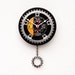 Clock made from a recycled Bike Chain ring and a 45 Record
