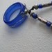 Cobalt blue wire wrapped seaglass inspired hoop pendant, great eyeglass holder TrAsH gLaSs
