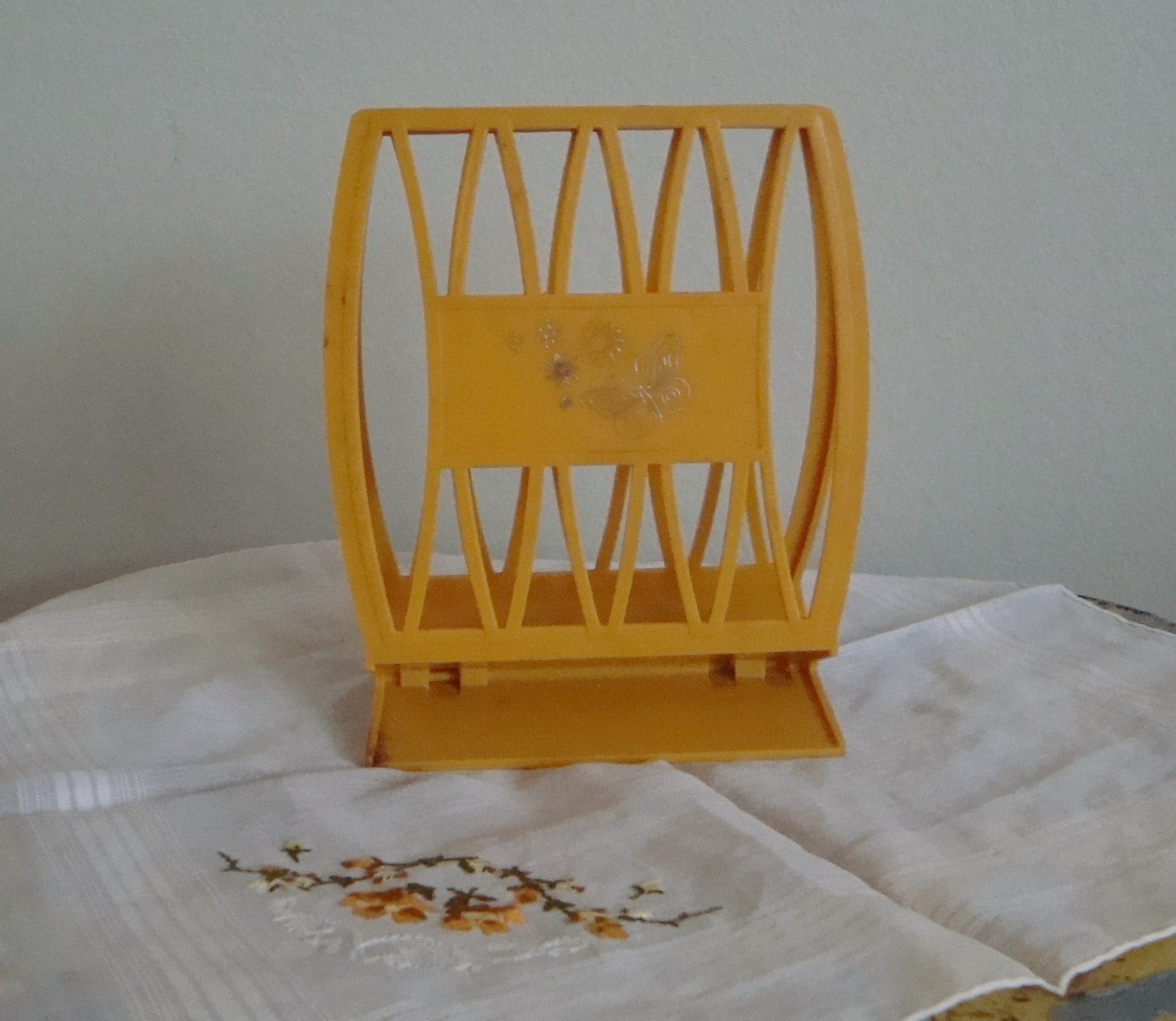 Vintage plastic yellow napkin holder with flowers and