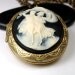 Cameo Locket Heirloom dancing lovers couple black creme oval Keepsake Golden brass