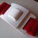 Electric Belt in Ruched Red