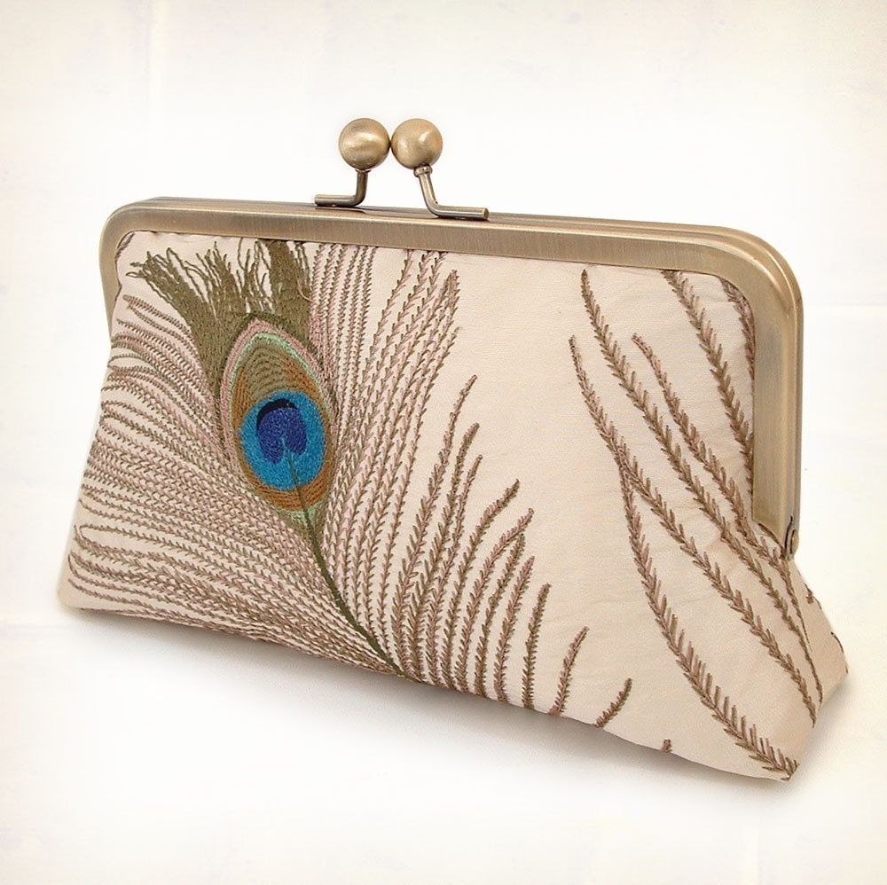 Shop by category A clutch version of a classic straw bag, with a cool fan shape and leather closure. Long story short, it's the perfect finishing touch.. Rattan.