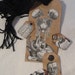 Scientific curiosities book mark or gift tag of conjoined tiwns and medical odditites.