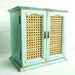 Handpainted Aqua Jewelry Chest.... Woven Cane Doors and 4 Drawers