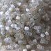 OFF WHITE GLASS SEED BEADS ....1 OUNCE 1mm