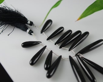 1/2 strand black onyx smooth pollished drops wholesale prices 18.00 REDUCED TO 12.00