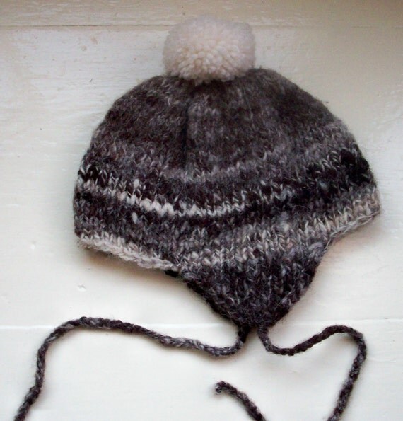Child's knit pompom hat  handspun rare breed by SpinningStreak