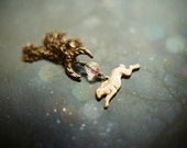 Moon Hare, antiqued brass necklace featuring running hare and crescent moon.