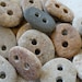 5 BABY STONE BUTTONS...5 sweet little hand drilled beach stones pebble earth grey organic beads