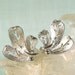 Brushed Silver Tone Feather Clip On Earrings