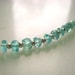 4mm Apatite Faceted Rondelle Parcel of Twelve Item No. 0002