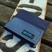 Eco friendly vegan seatbelt wallet made from reclaimed seat belt straps and used bike inner tube