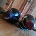 Wine rack made from a melted recycled wine bottle