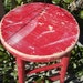 vintage red painted wood stool