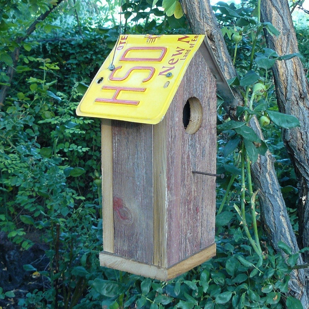 Rustic barnwood birdhouse with New Mexico license plate roof