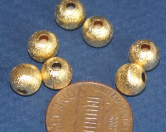 50 pcs of Gold plated round brush beads 7mm