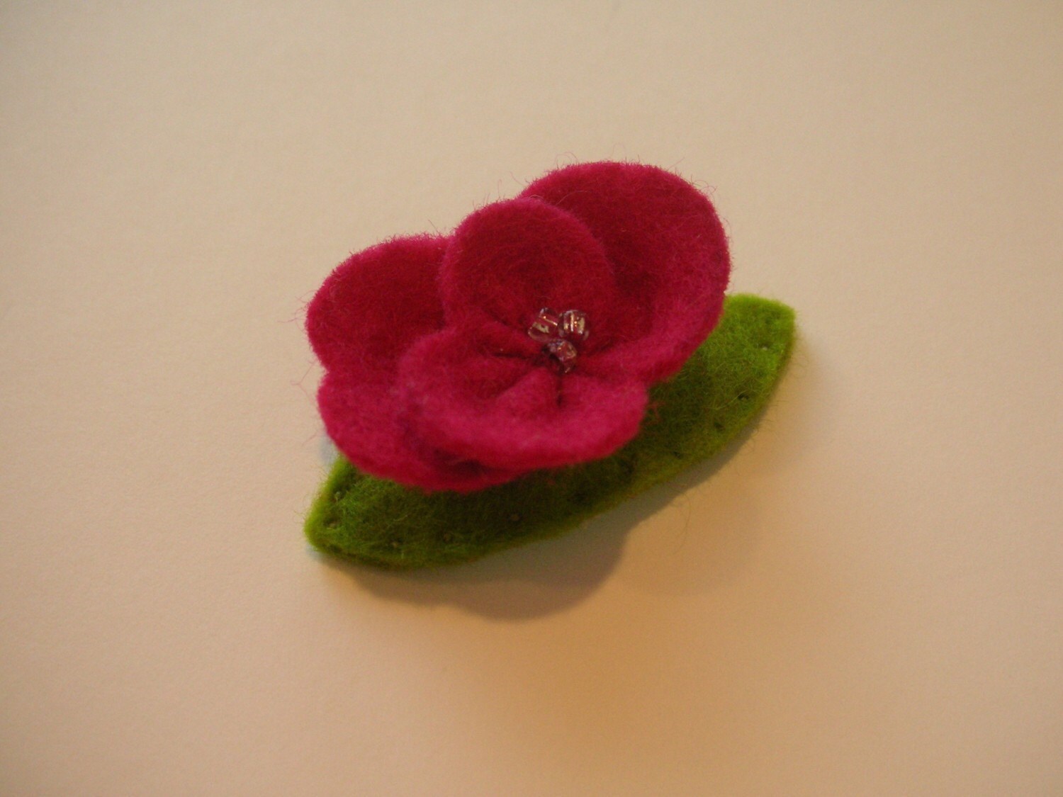 Wool felt hair clip Fuchsia swirly flower